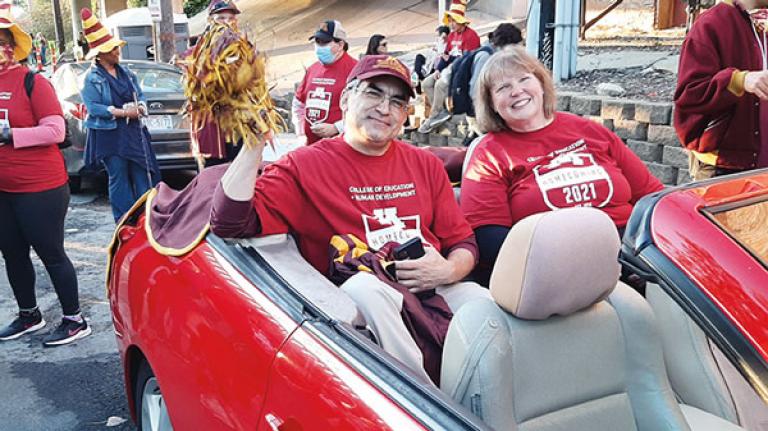 Dean Rodriguez and Sheila Piippo in the parade car