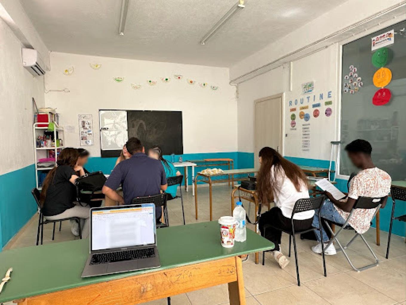 Observing language learning classroom for young adults in Polykastro, home of Nea Kavala Refugee Camp