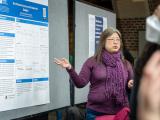Attendee presenting a poster 